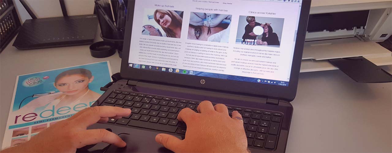 An image of someone typing on a laptop to illustrate the blogs and offers page
